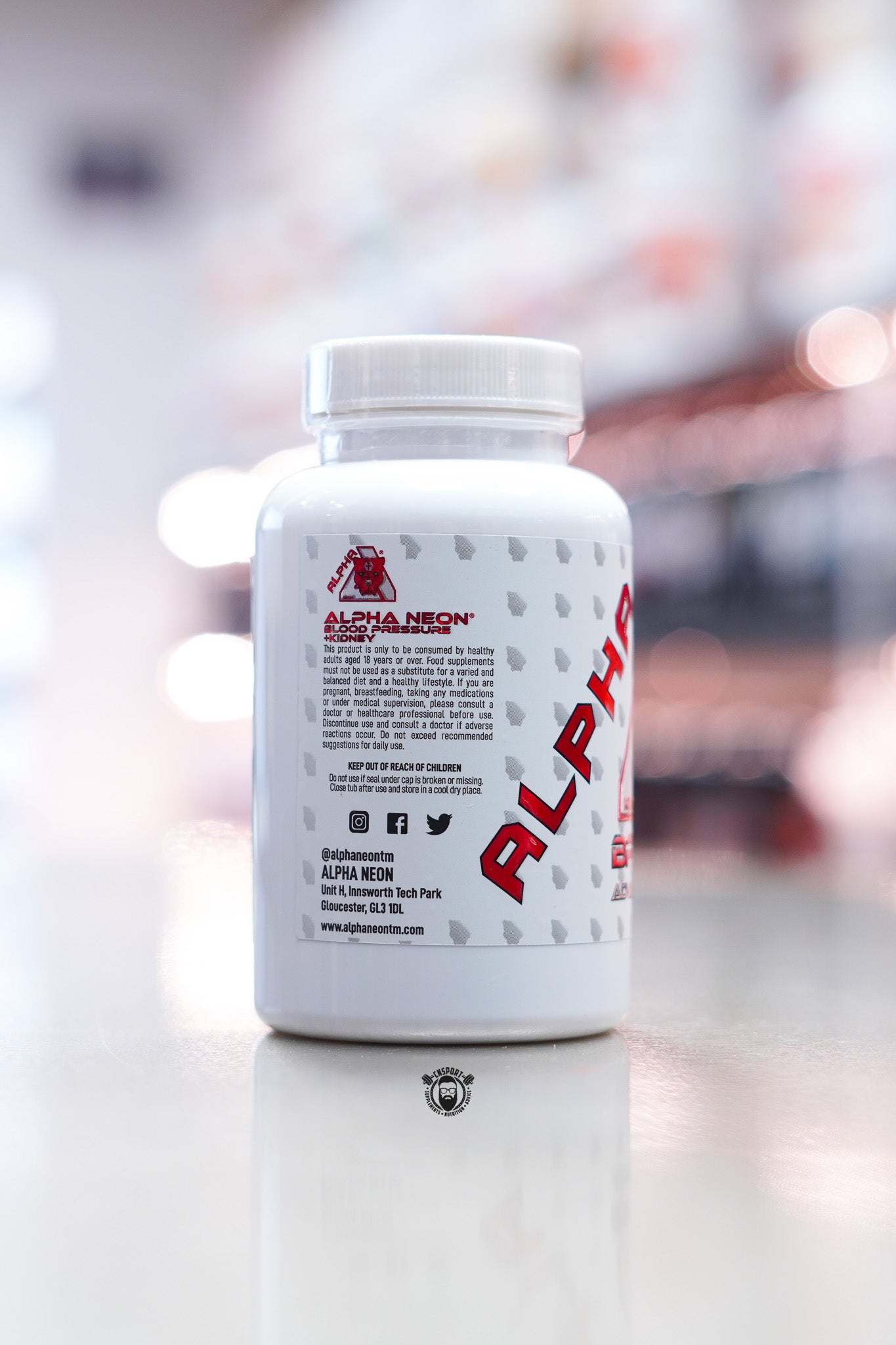 Alpha Neon BP + Kidney Advanced Support supplement bottle showing brand information and usage details on side label.