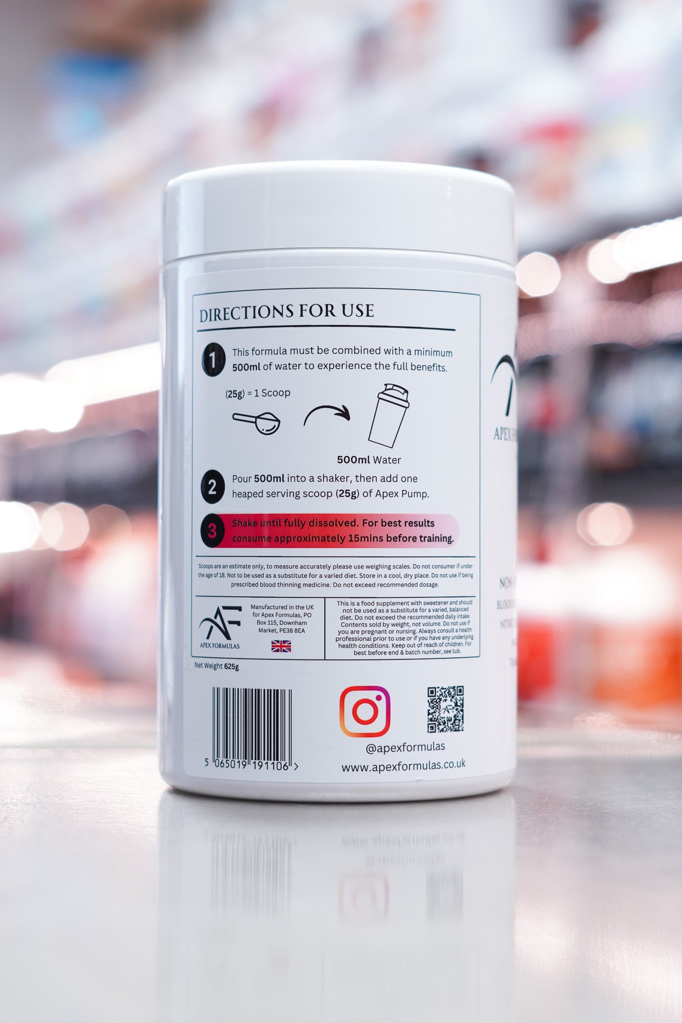 Apex Pump Raspberry Rush pre-workout side label showing usage directions, ingredient guidance, and manufacturer details.