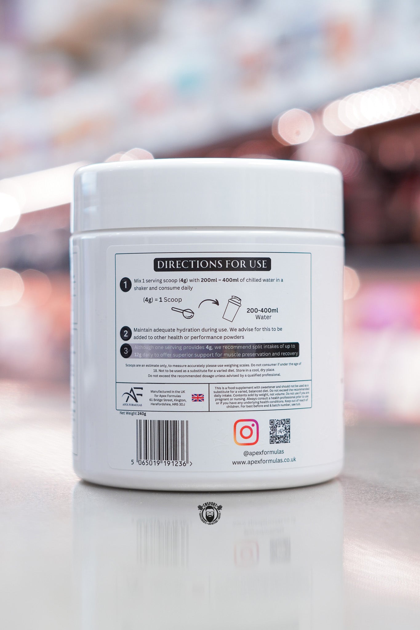 Apex Formulas HMB tub showing directions for use, 4g scoop per serving with 200–400ml water.