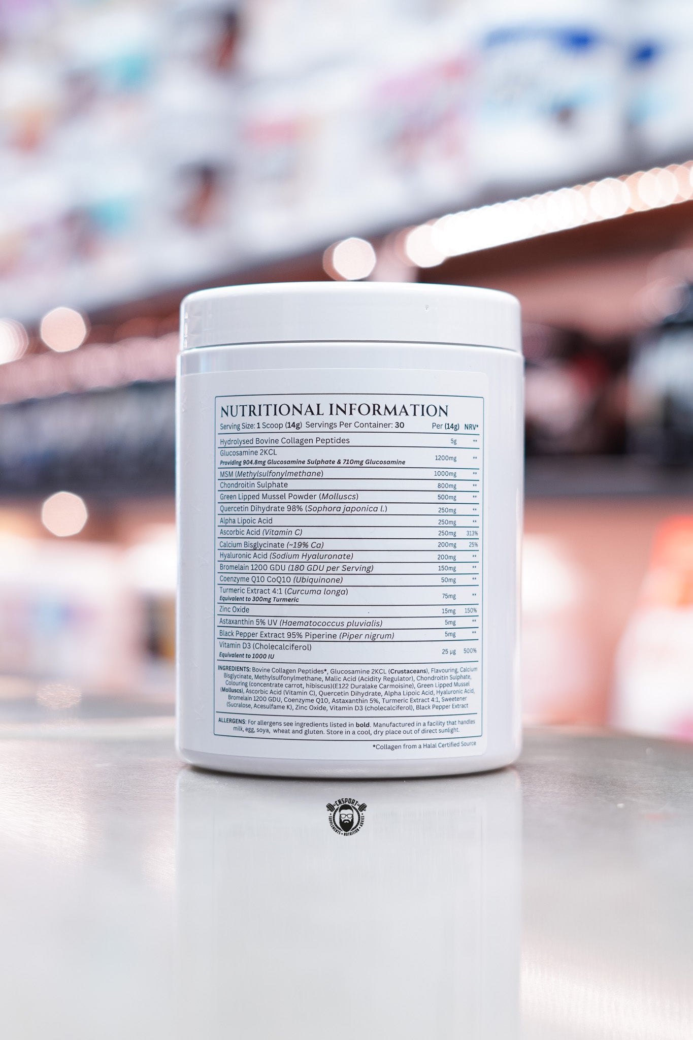 Close-up of Apex Formulas Joint Support Black Cherry tub showing detailed nutritional information panel, listing collagen peptides, glucosamine, MSM, chondroitin, vitamins, minerals, and other joint health ingredients.