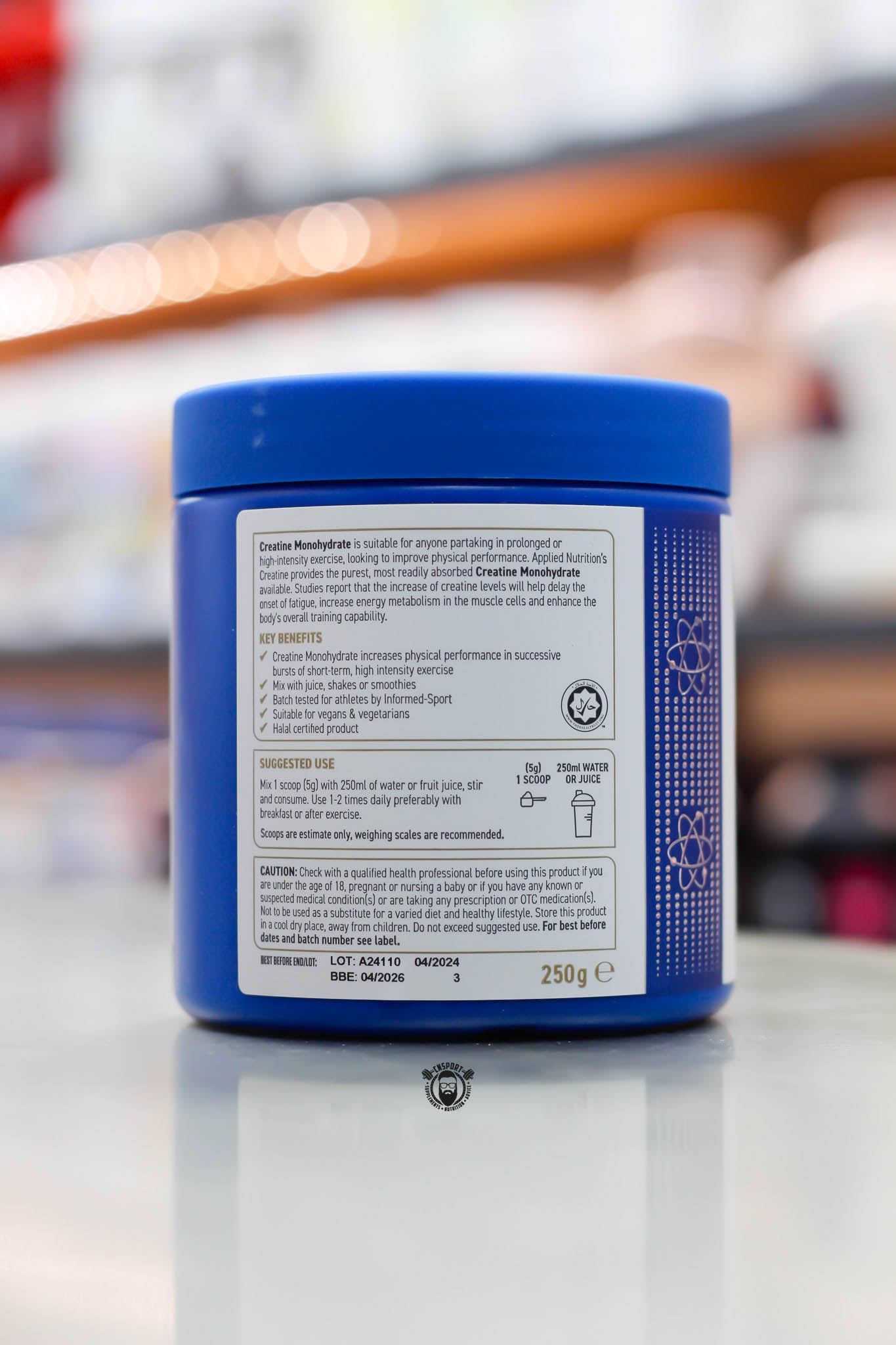 Side label of Applied Nutrition Creatine Monohydrate displaying benefits, suggested use, cautions, and recommended daily intake.