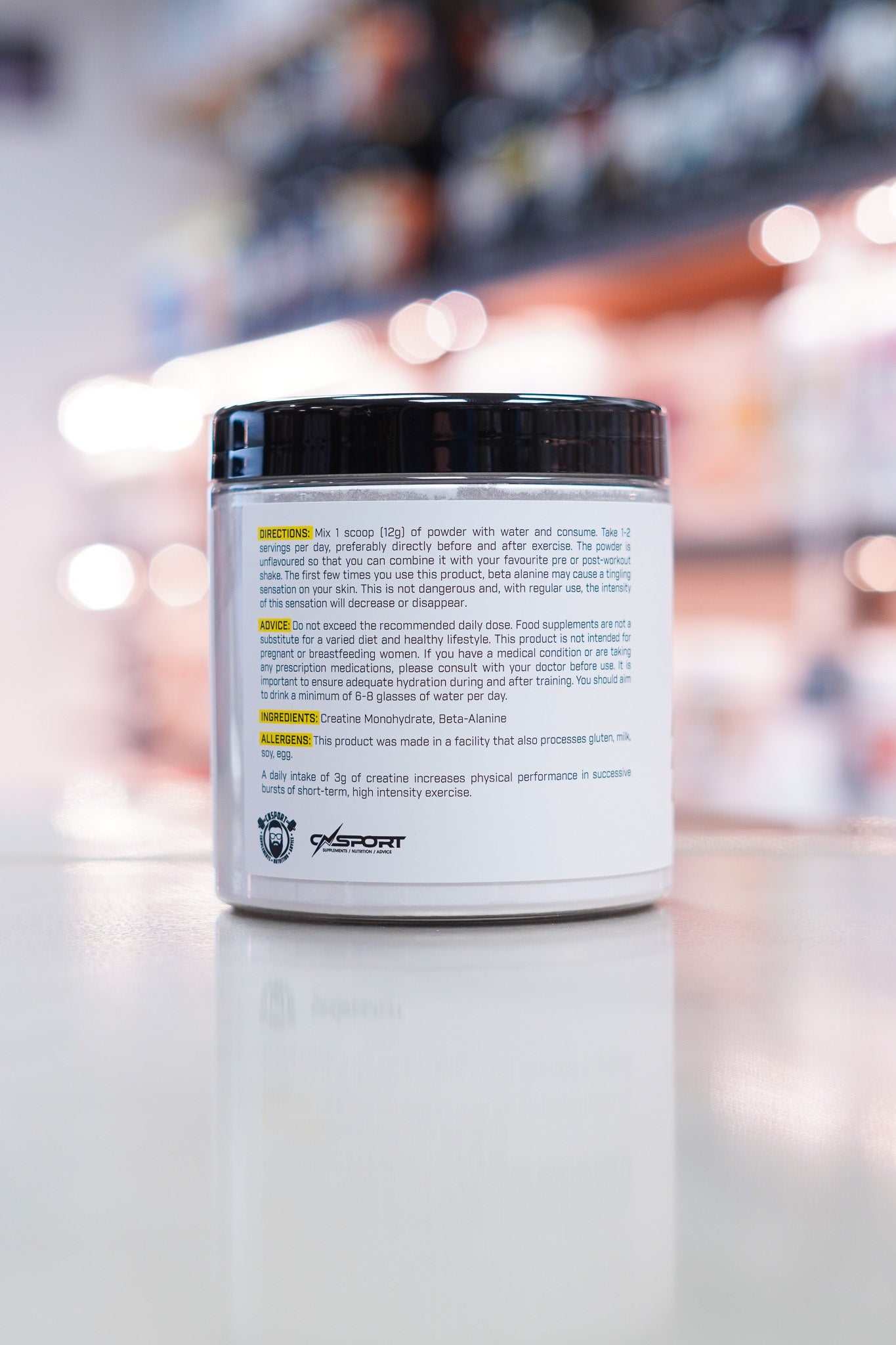 CNSport Creatine & Beta Alanine tub showing directions, ingredients, storage instructions, and barcode on label.