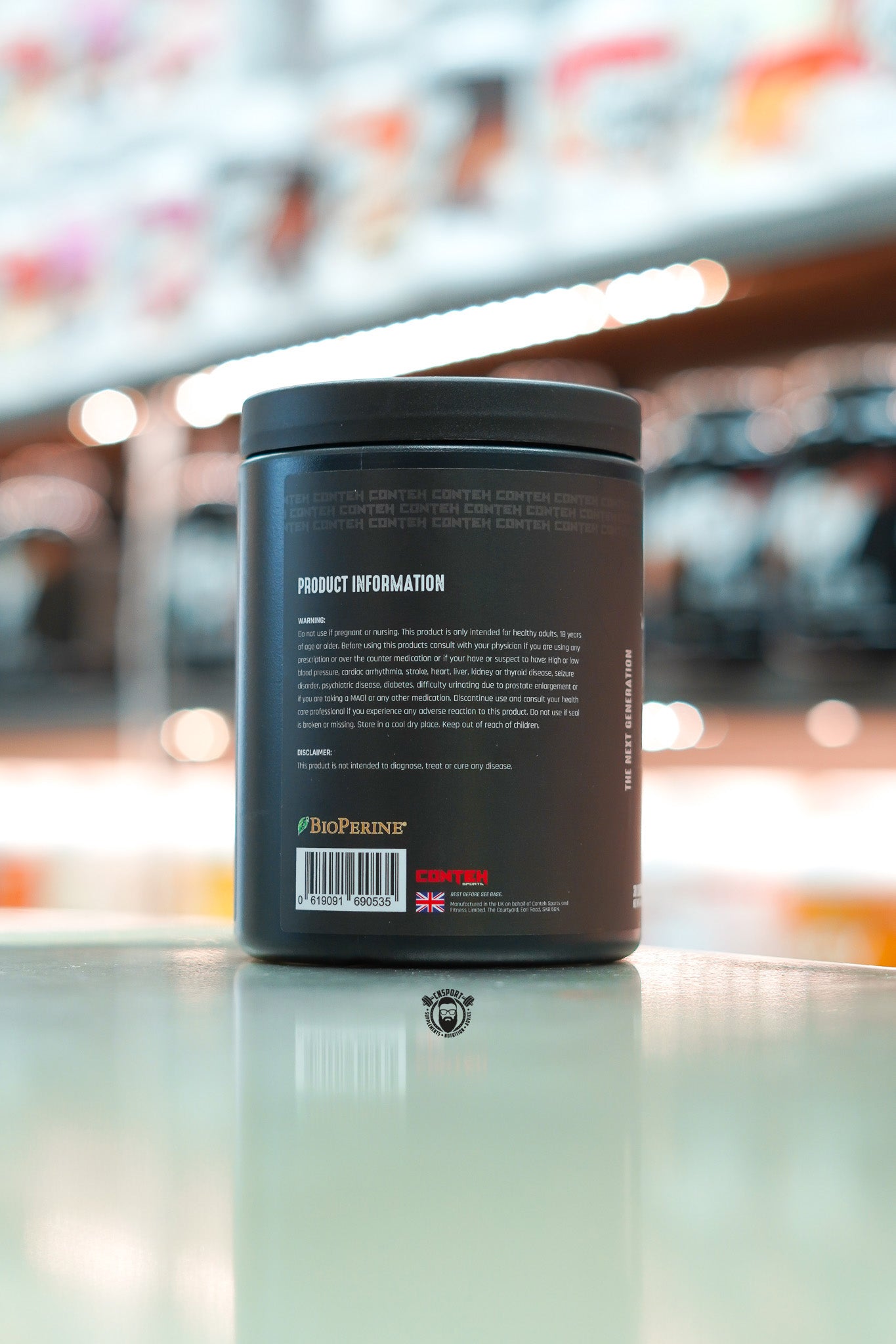 Conteh Sports The Pump non-stim pre-workout, Berry flavour, 30 servings (414g) black tub showing product information and warning label.