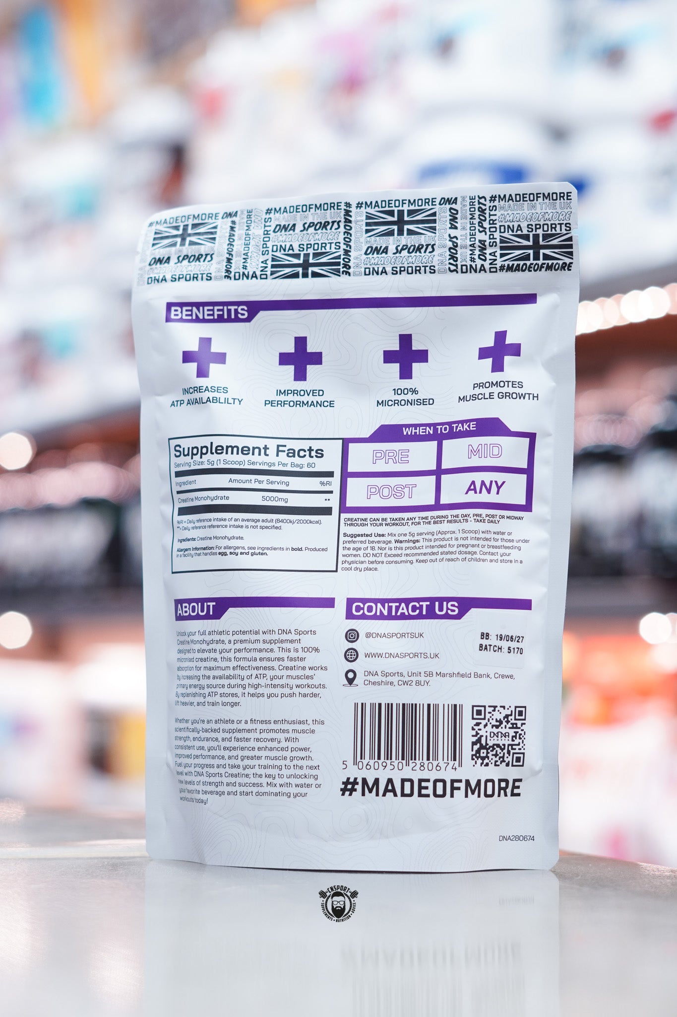 White resealable pouch of DNA Sports Creatine Monohydrate, showing supplement facts, benefits icons, directions, about section, and contact information.