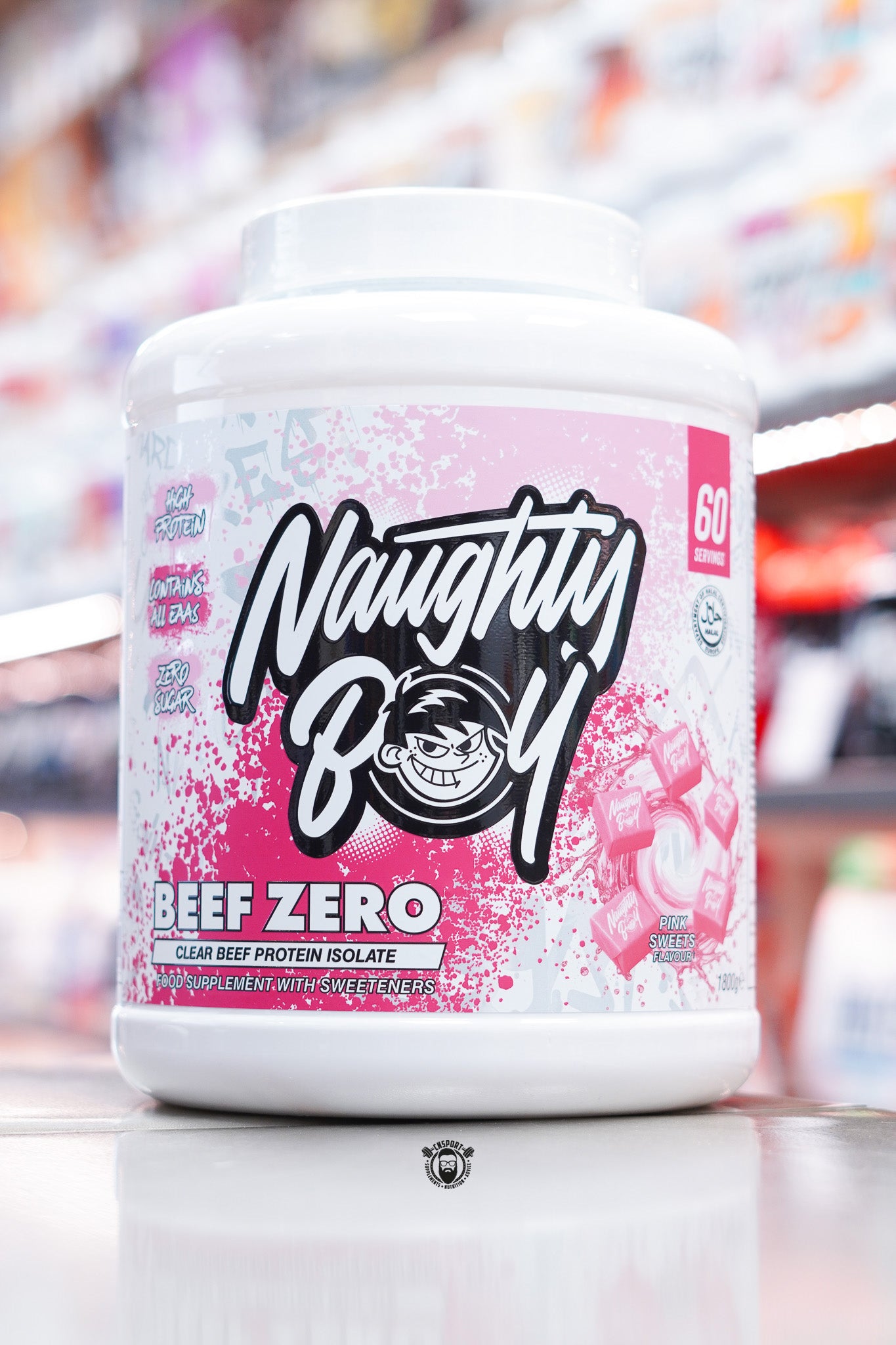 Front of Naughty Boy Beef Zero Pink Sweets 1.8kg tub with pink splatter design, Naughty Boy logo, and wrapped pink sweet imagery.
