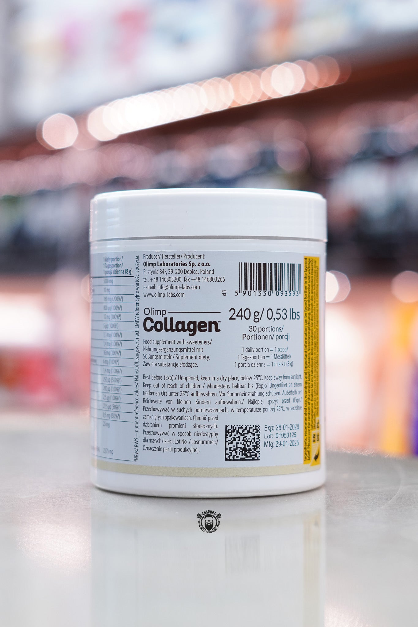 Back of Olimp Collagen supplement tub showing manufacturer details, QR code, barcode, and storage instructions.