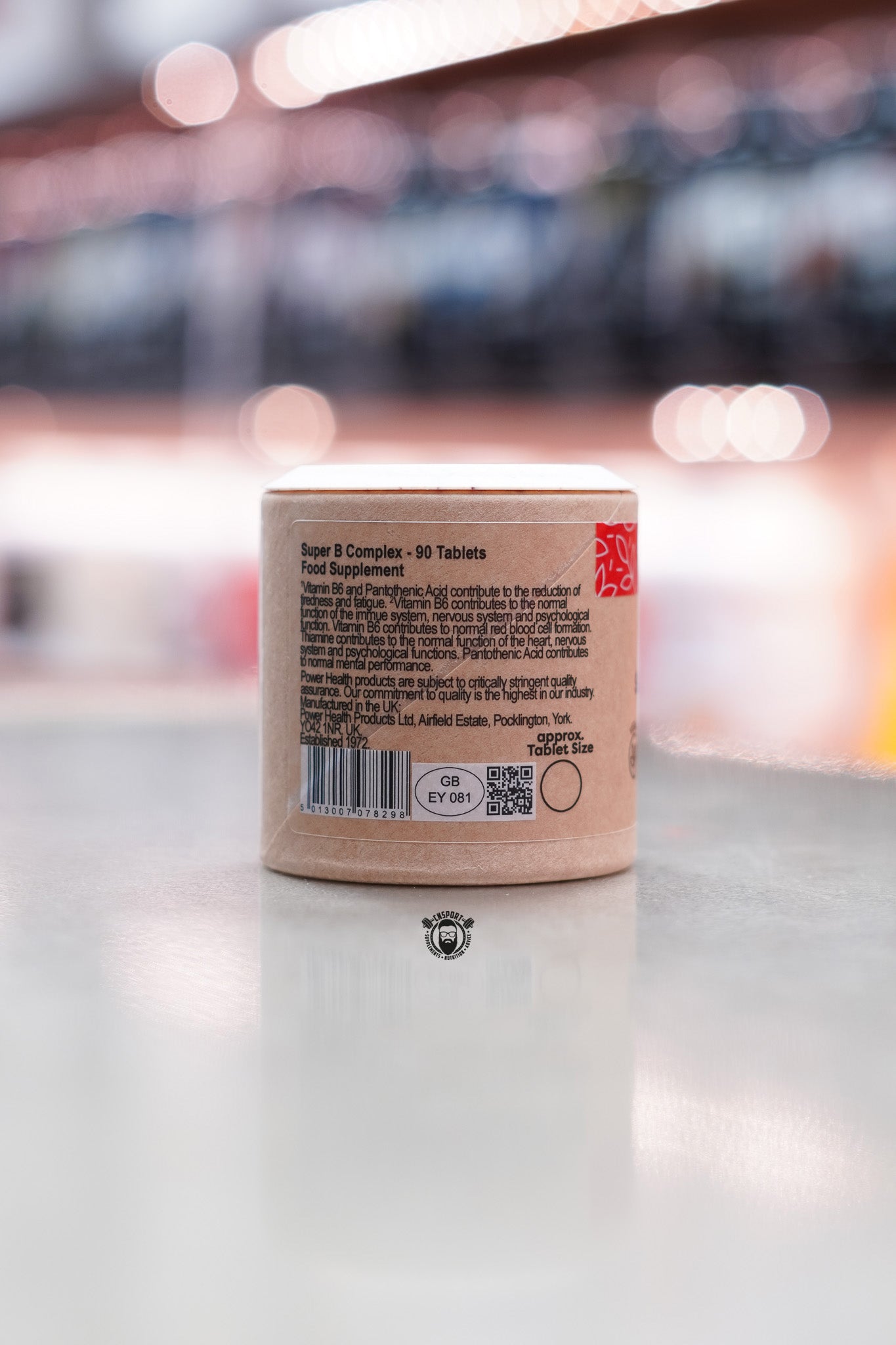 Side view of Power Health Super B Complex packaging displaying product description, manufacturer details, and barcode.