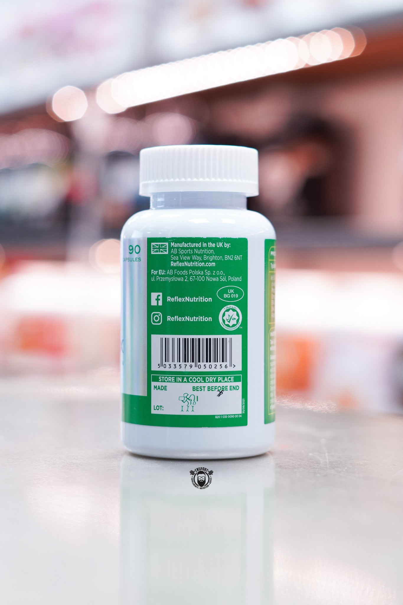 Reflex Nutrition Krill Oil – side label with manufacturing location, barcode, and storage instructions.