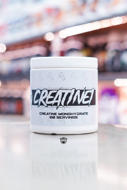 1 Source Supplements Creatine Monohydrate tub, 60 servings, displayed on supplement store counter.