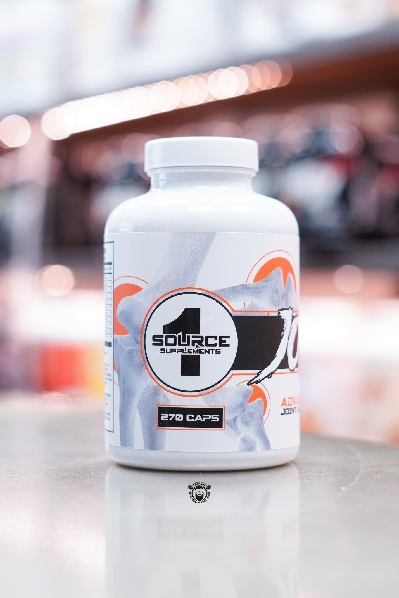 Side view of 1 Source Supplements Joint 1 Advanced Joint Support with the “1 Source Supplements” logo, bone illustration, and label details on a white 270-capsule bottle.