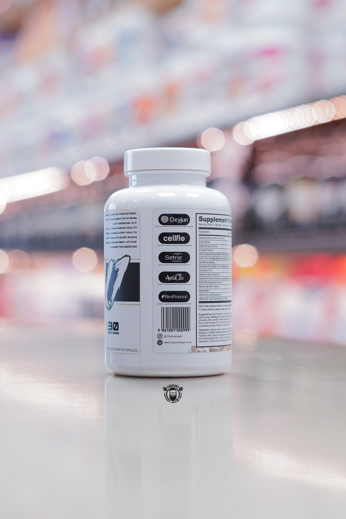 Side view of 1 Source Supplements Vital 1 capsule bottle showing supplement facts icons and barcode.