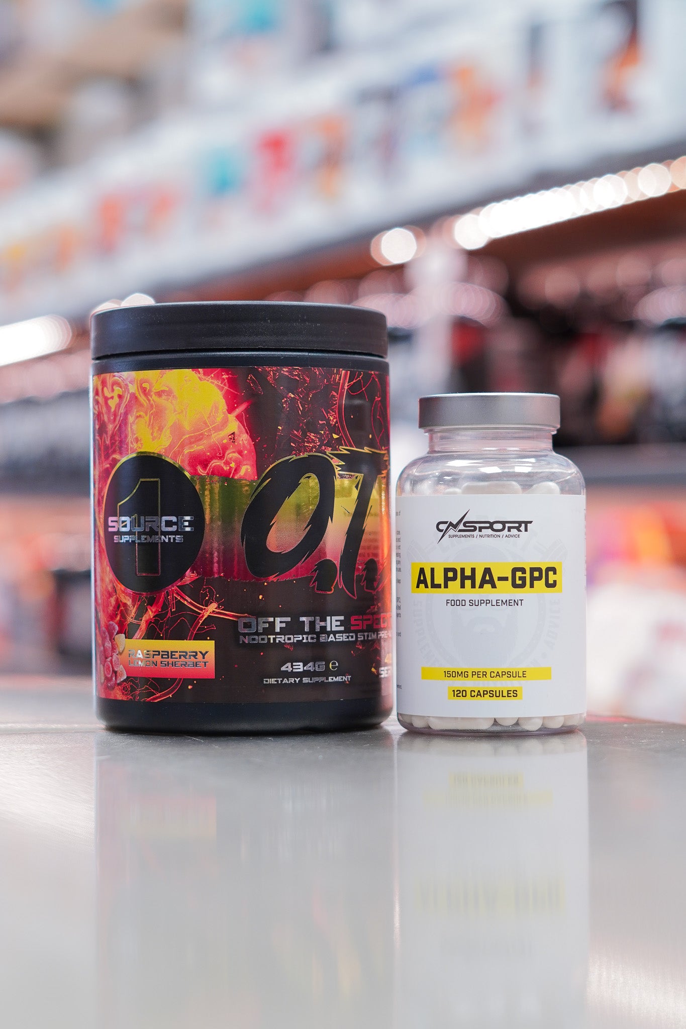 1 Source Supplements OTS pre-workout Raspberry Lemon Sherbet flavour (434g) with CNSport Alpha-GPC 150mg capsules (120 capsules) displayed on supplement store counter