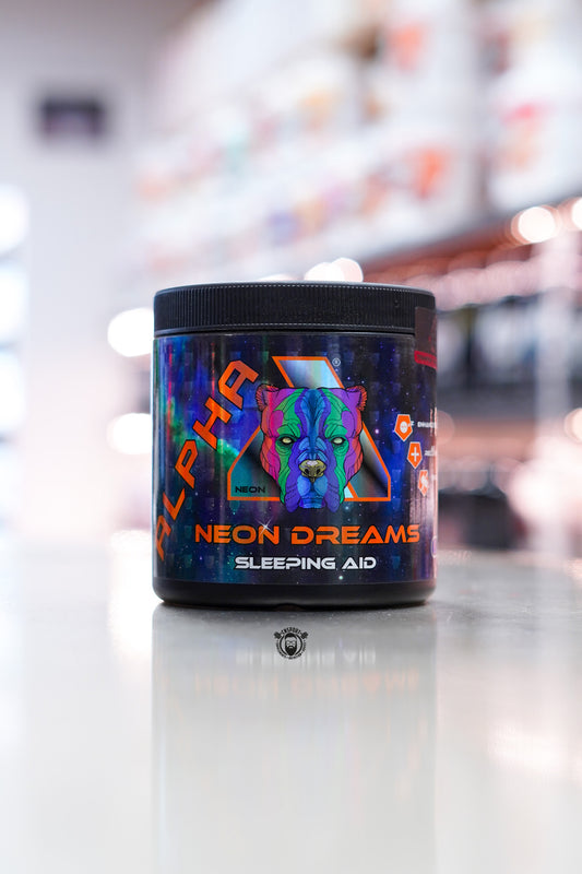 Alpha Neon Neon Dreams sleep aid supplement tub, Grape flavour, 30 servings, on supplement store counter.