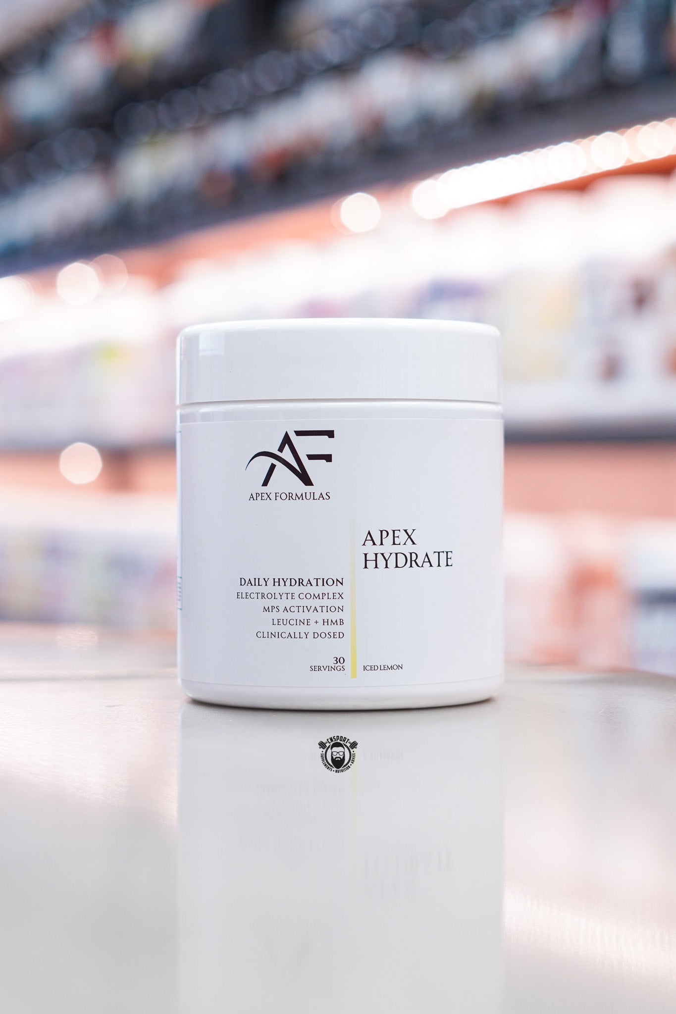 Apex Formulas Apex Hydrate daily hydration formula in Iced Lemon flavour, featuring a clinically dosed electrolyte complex with Leucine, HMB, Aquamin® minerals, Himalayan rock salt, and MPS activation support for hydration, recovery, and performance.