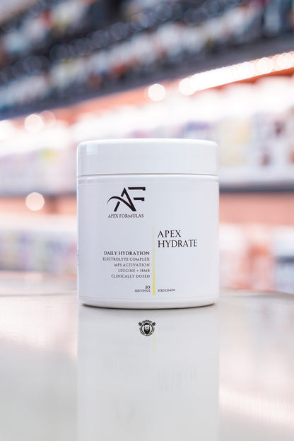 Apex Formulas Apex Hydrate daily hydration formula in Iced Lemon flavour, featuring a clinically dosed electrolyte complex with Leucine, HMB, Aquamin® minerals, Himalayan rock salt, and MPS activation support for hydration, recovery, and performance.