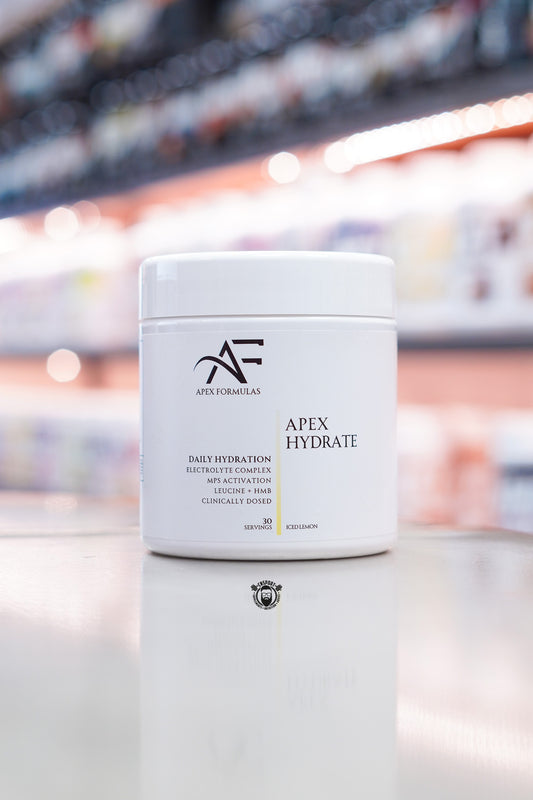 Apex Formulas Apex Hydrate daily hydration formula in Iced Lemon flavour, featuring a clinically dosed electrolyte complex with Leucine, HMB, Aquamin® minerals, Himalayan rock salt, and MPS activation support for hydration, recovery, and performance.