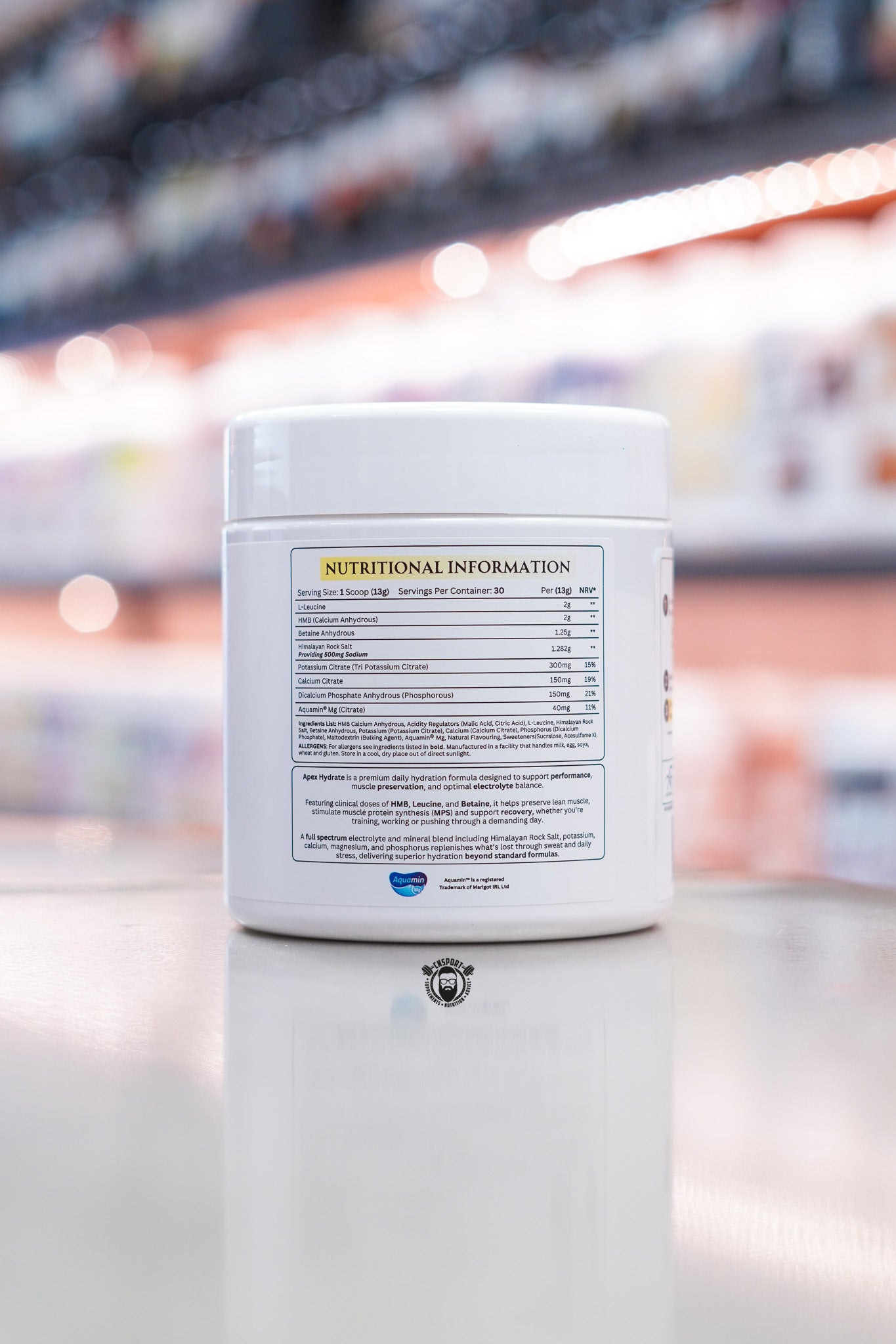 Nutritional information panel for Apex Formulas Apex Hydrate Iced Lemon displaying serving size, Leucine, HMB, Betaine Anhydrous, Himalayan Rock Salt, Potassium Citrate, Calcium Citrate, Phosphorus, Aquamin® minerals, ingredients list, and allergen information.