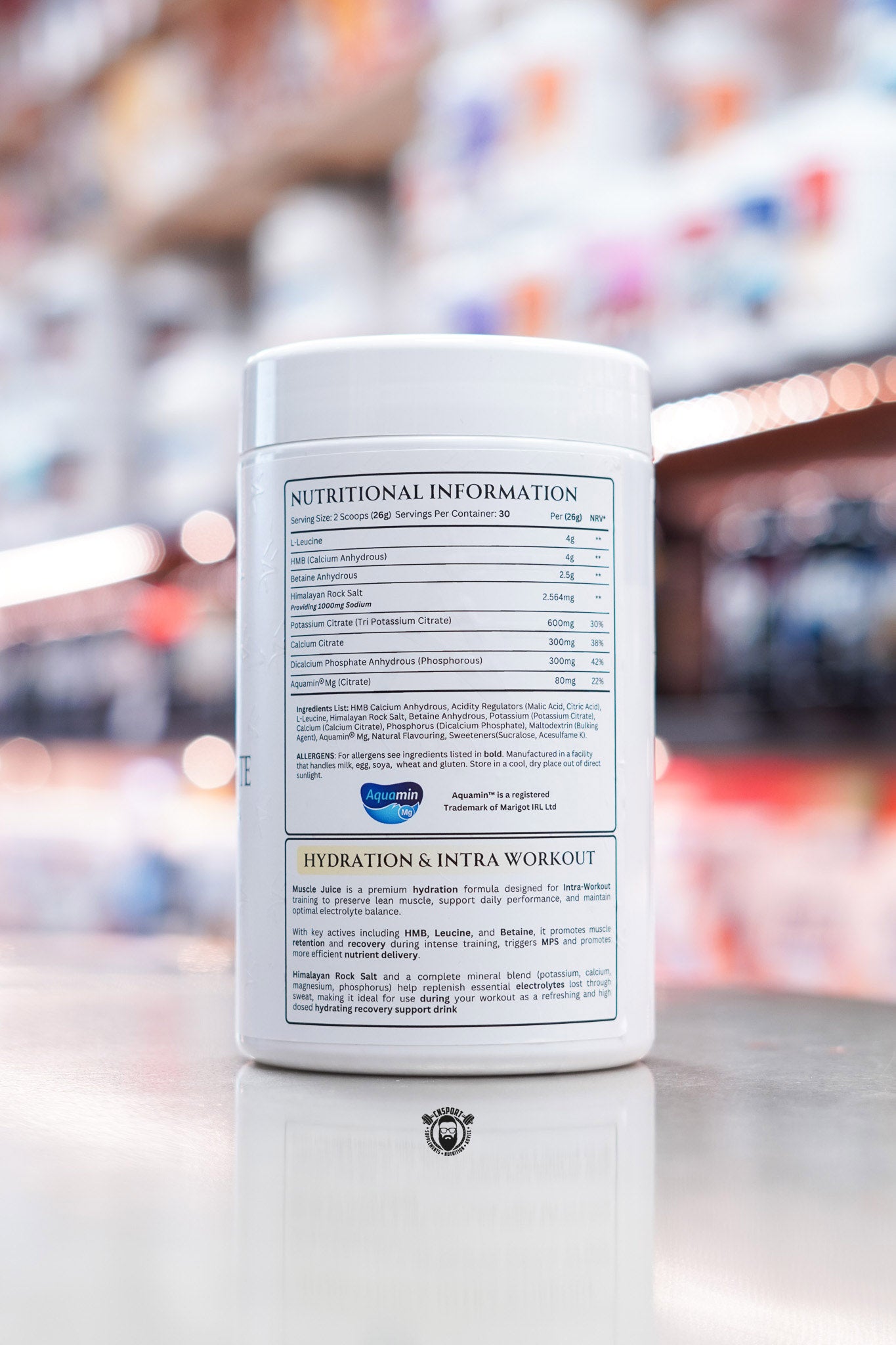 Close-up of Apex Formulas Intra Hydrate supplement showing detailed nutritional information, ingredient list, and hydration formula description.