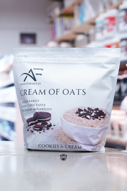 Apex Formulas Cream of Oats Cookies & Cream flavour 2kg pouch displayed on supplement store counter.