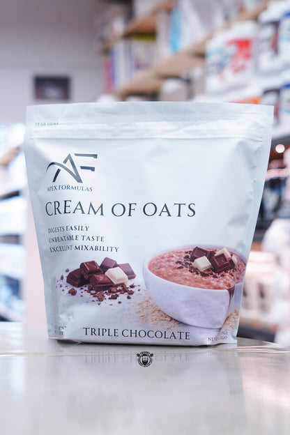 Apex Formulas Cream of Oats Triple Chocolate flavour 2kg pouch displayed on supplement store counter.