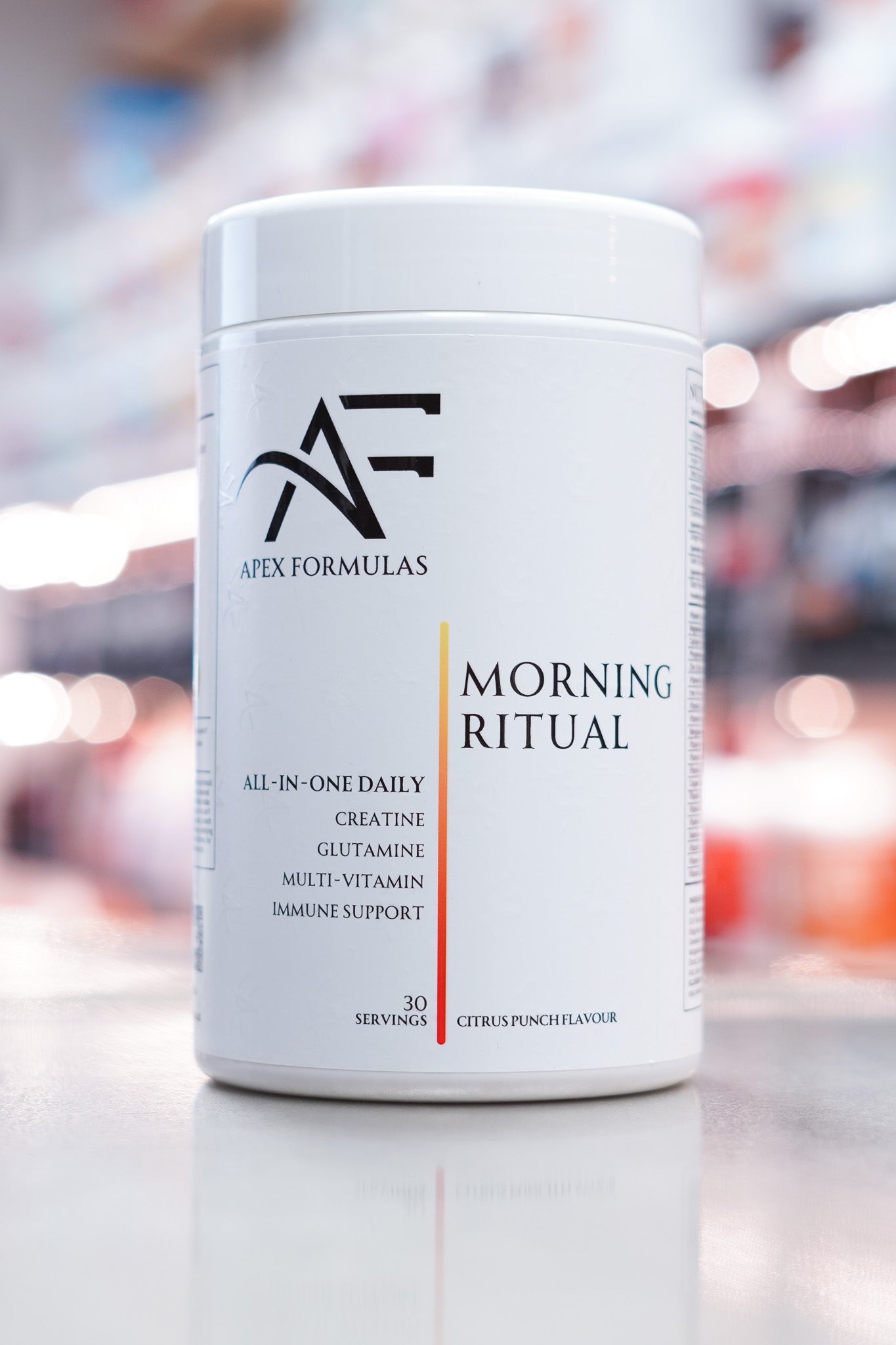 Apex Formulas Morning Ritual Citrus Punch all-in-one supplement tub with 30 servings, featuring creatine, glutamine, multivitamins, and immune support.