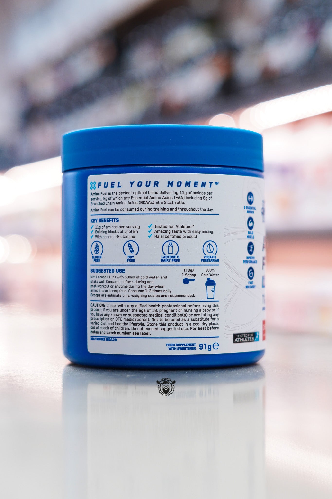 Side panel of Applied Nutrition Amino Fuel Ultimate EAAs showing product benefits, suggested use instructions, allergen information and serving guidance.