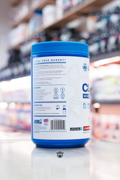 Side view of Applied Nutrition Clear Whey Protein Cherry & Apple 875g showing key benefits, suggested use and product information.