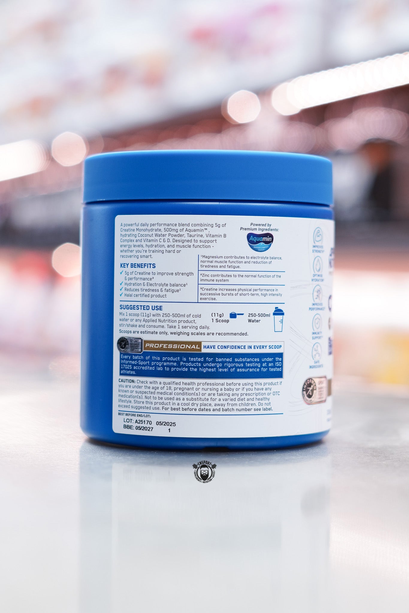 Applied Nutrition Creatine + Hydration tub side label with usage instructions, key benefits, safety warnings, and batch/expiry details.

