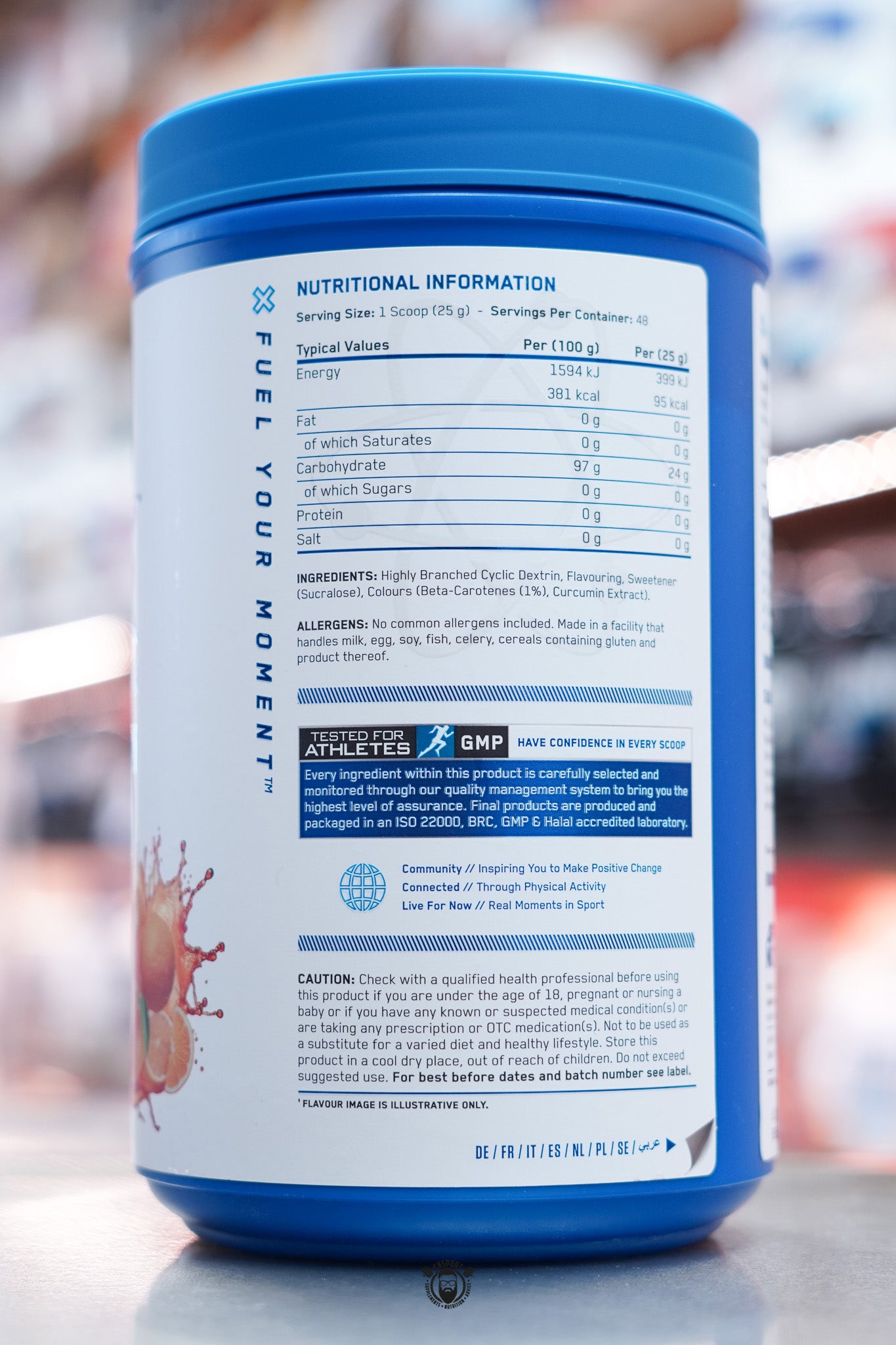 Close-up of Applied Nutrition Carb-X Orange Burst label showing nutritional information, ingredient list, and manufacturer details.