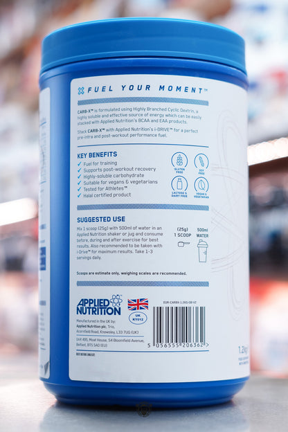 Side view of Applied Nutrition Carb-X Orange Burst container displaying key benefits, usage instructions, and certification logos.