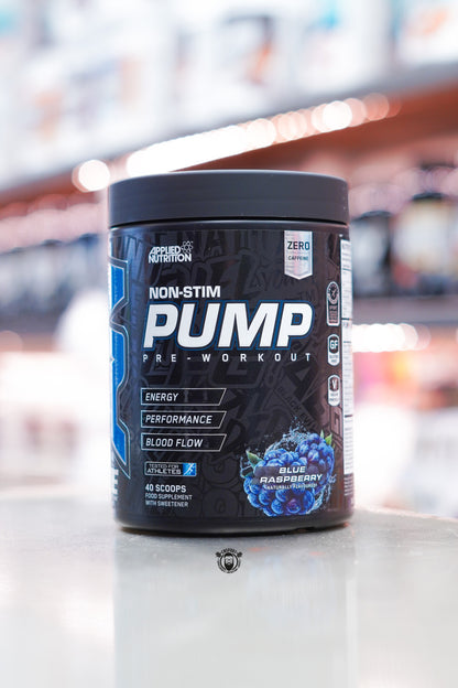 Applied Nutrition ABE Non-Stim Pump pre-workout, Blue Raspberry flavour, zero caffeine, 40 scoops, displayed on supplement store counter.