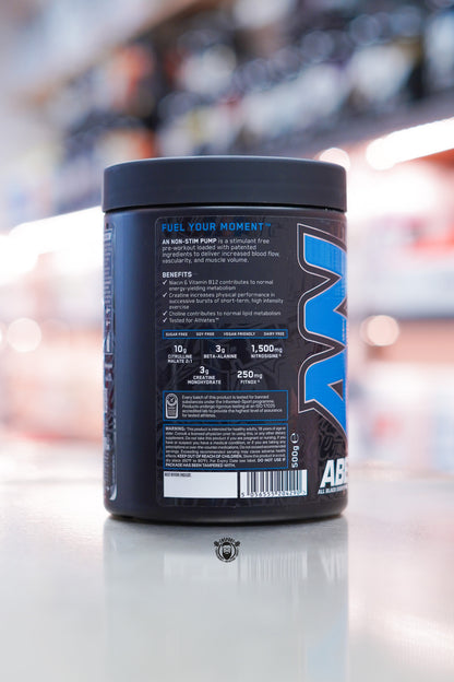 Applied Nutrition ABE Pump non-stim pre-workout tub showing benefits panel with citrulline, beta-alanine, and creatine content, Blue Razz flavour.