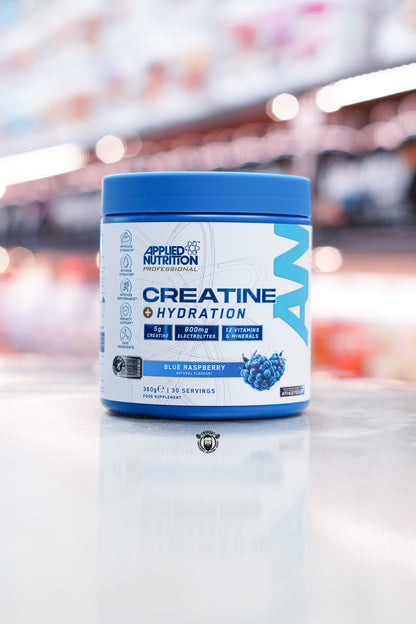 Applied Nutrition Creatine + Hydration supplement in Blue Raspberry flavour, 360g tub with 30 servings, front view showcasing product benefits and ingredients.