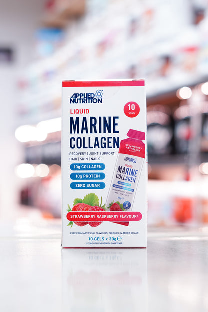 Front of the box showing product name, flavour, collagen and protein content, and imagery of strawberries and raspberries.