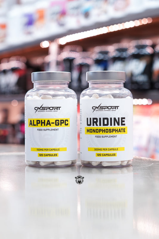 Front-facing image of CNSport Alpha-GPC and Uridine Monophosphate bundle, showing both supplement bottles side by side with clean white labels and yellow highlights, photographed on a bright retail counter.