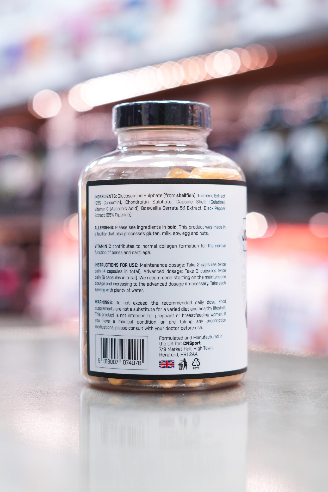 Side view of CNSport Joint Support+ supplement displaying full ingredients list, allergen information, usage directions, and manufacturer details.