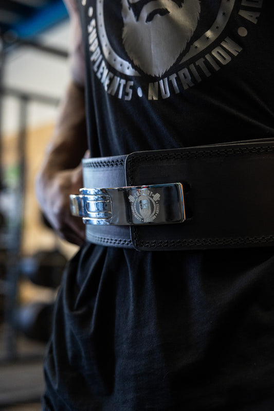 CNSport Lever Belt close-up with polished steel buckle and engraved logo