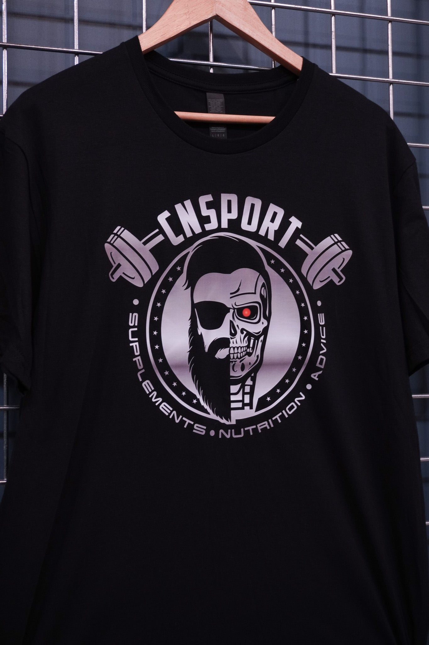 Detailed crop of CNSport Terminator T-shirt graphic featuring cyber skull design and CNSport branding