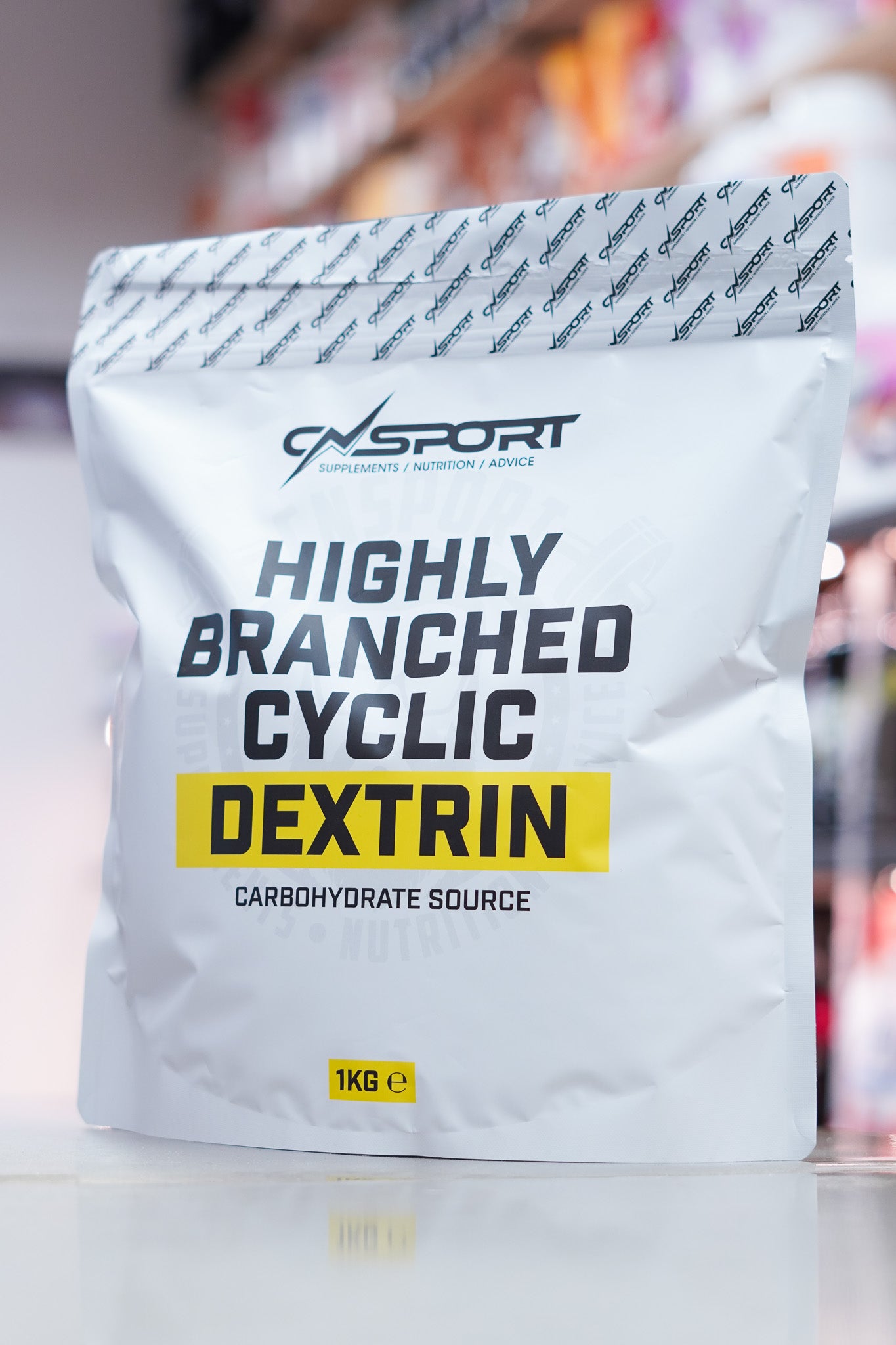 Front-facing image of CNSport Highly Branched Cyclic Dextrin 1kg pouch showing clean white packaging with bold black and yellow label design.