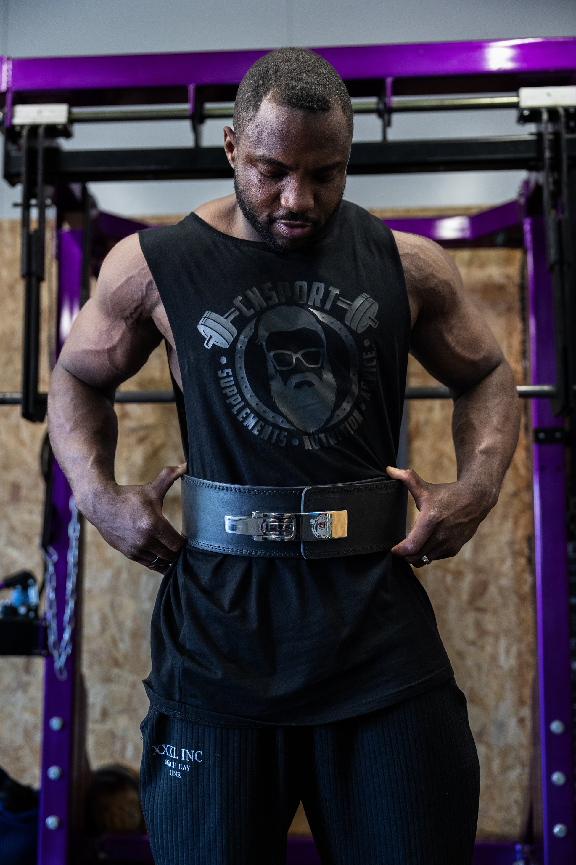 Athlete wearing CNSport Lever Belt in gym during workout