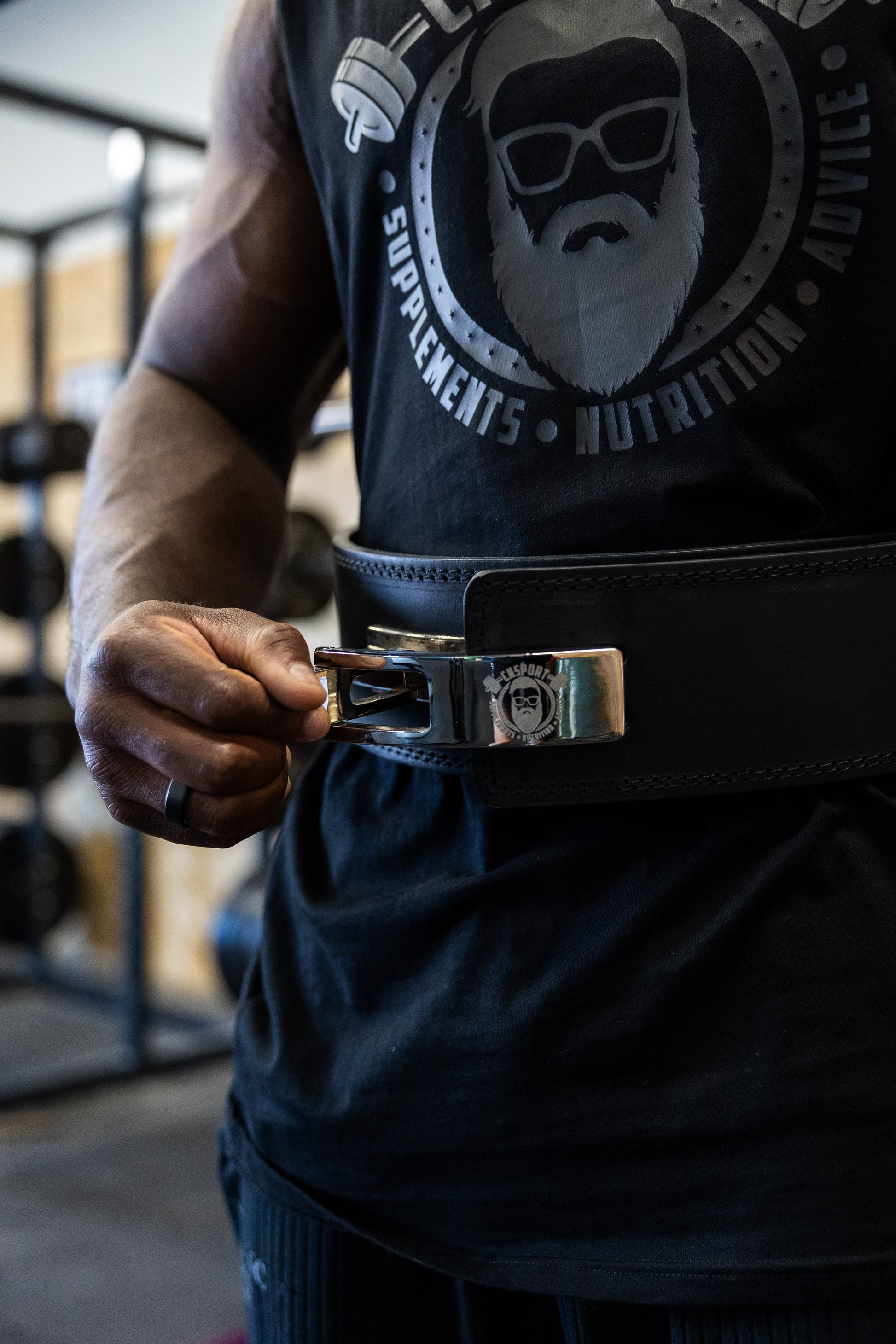 CNSport Lever Belt being fastened with secure lever mechanism