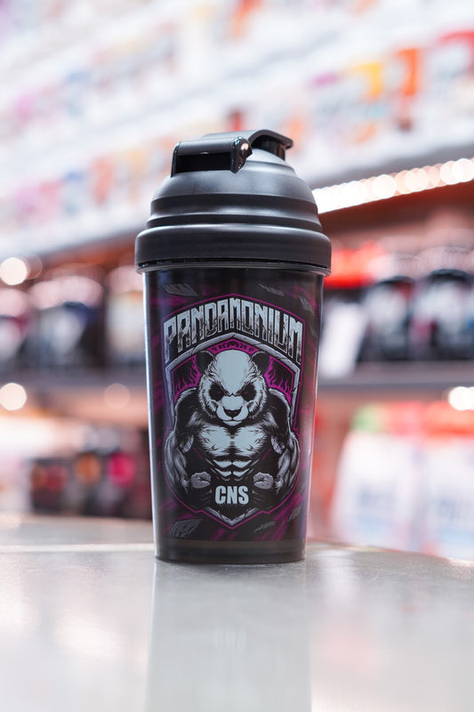 Full front shot of the CNSport Pandamonium shaker showing the detailed panda mascot artwork and bold branding, photographed indoors with bright bokeh lighting.