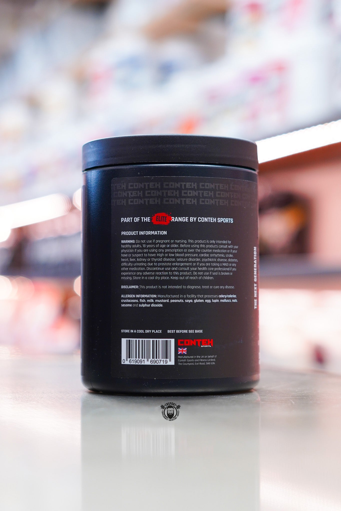 Conteh Sports Mega Pump Elite pre-workout tub, Grape flavour, supplement facts panel shown on back of tub.
