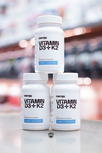 Front view of three Conteh Sports Vitamin D3 + K2 supplement bottles – one bottle stacked on top of two others, with clear product branding and label design.