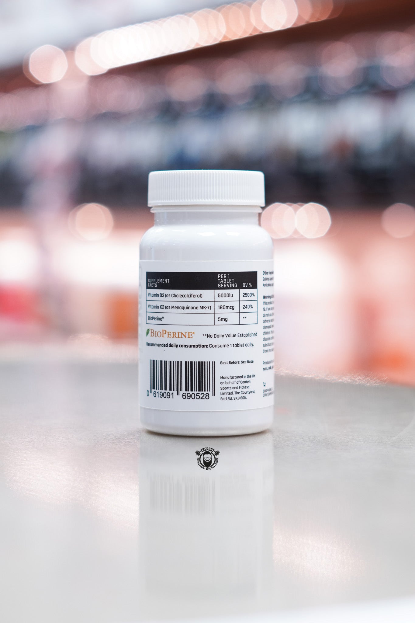 Back label of Conteh Sports Vitamin D3 + K2 supplement bottle – showing supplement facts panel listing Vitamin D3 (5000 IU), Vitamin K2 (180 mcg), and BioPerine (5 mg), along with dosage and barcode.