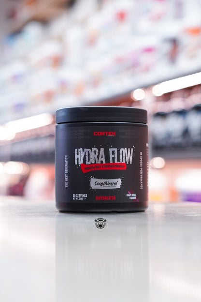 Conteh Sports Hydra Flow hydration supplement in Grape Soda flavour – 60 servings per container, displayed with vibrant grape accenting and CocoMineral branding.