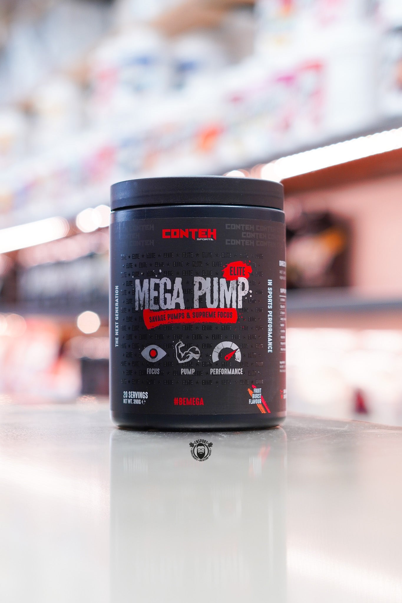 Conteh Sports Mega Pump Elite pre-workout tub, Fruit Burst flavour, displayed on supplement store counter.