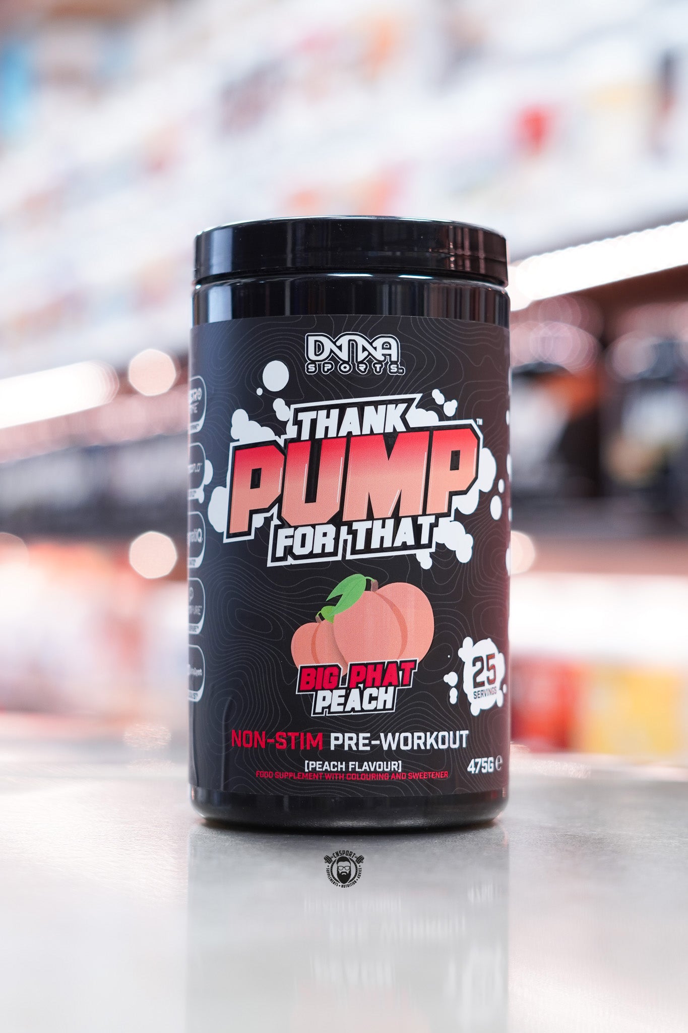 DNA Sports - Thank Pump For That Big Phat Peach (25 Servings) – Front label of a 475g black tub featuring a peach graphic, highlighting it as a non-stim pre-workout supplement with 25 servings.