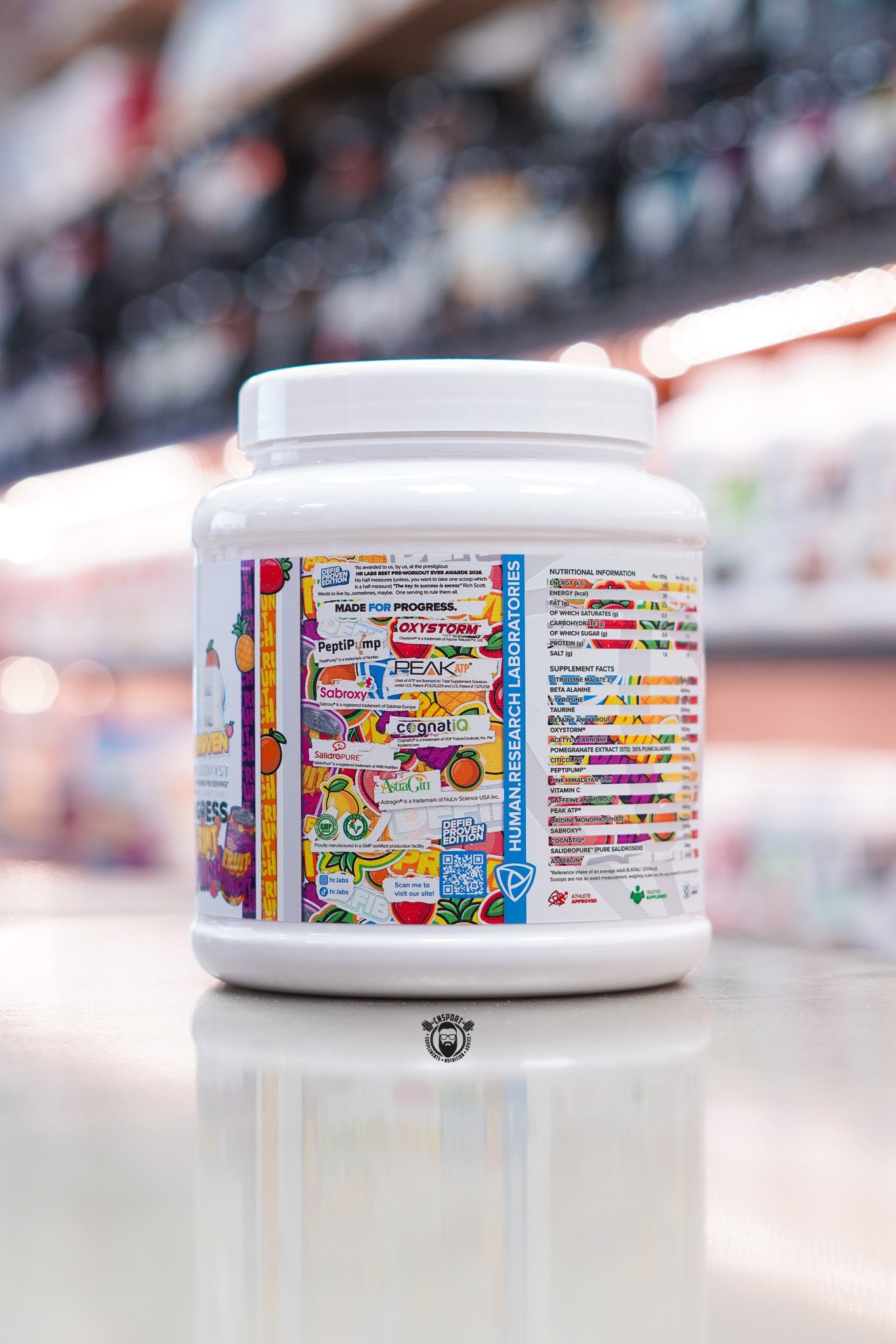 Side panel of the HR Labs Defib Proven Fruit Punch pre-workout tub highlighting key ingredients, nutritional information and product features.