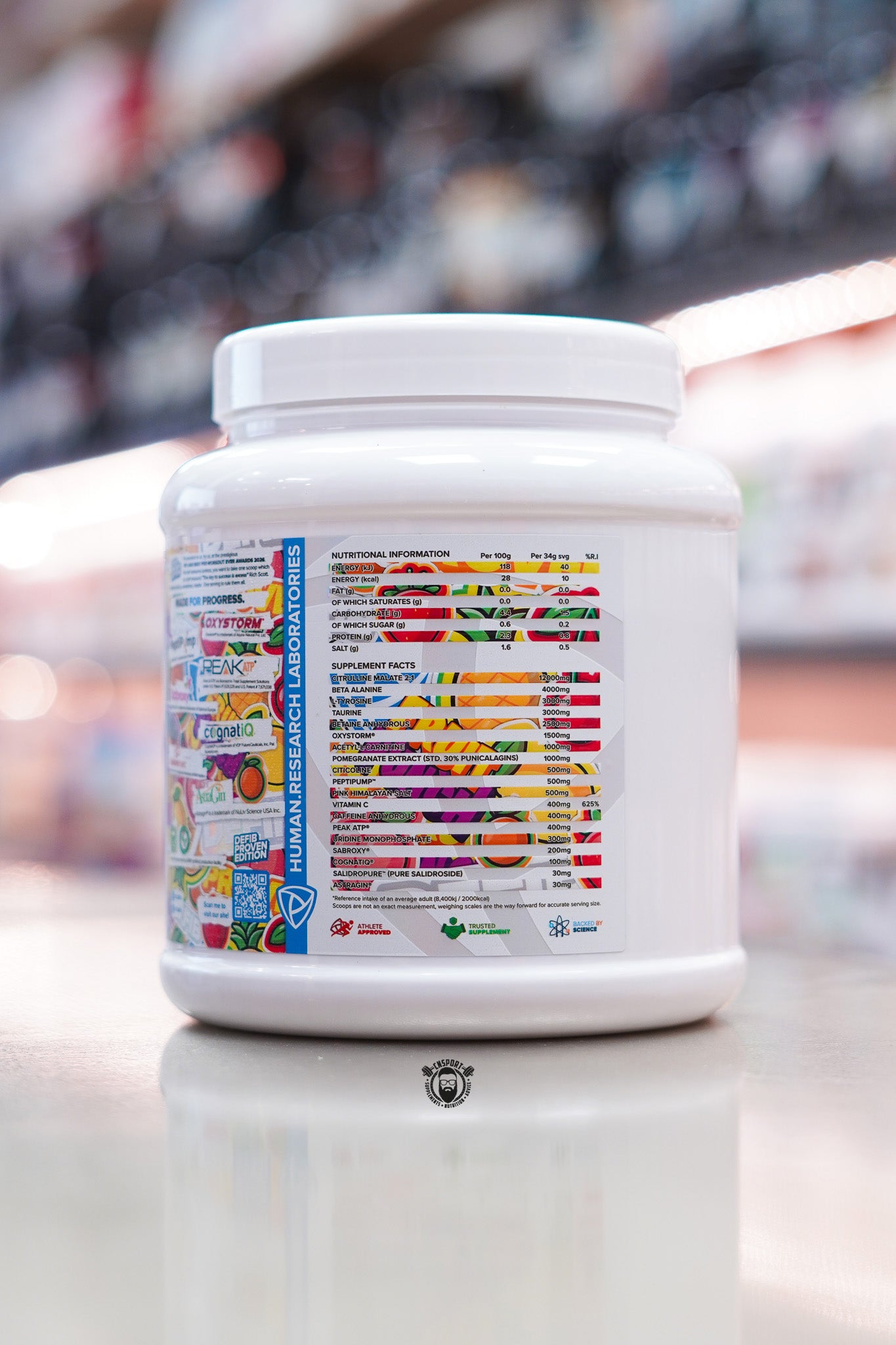 Rear nutrition panel of the HR Labs Defib Proven Fruit Punch pre-workout tub showing nutritional information, supplement facts and active ingredient amounts.